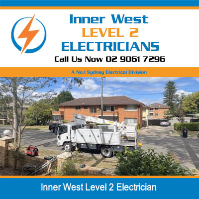 Utility truck working on power lines in Inner West